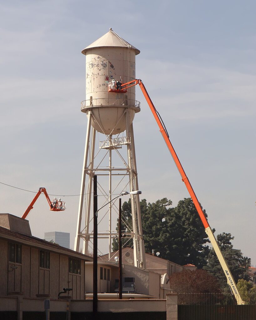 The Warner Bros. studio water tower in Burbank, California, during maintenance